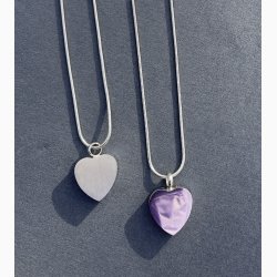 Hjertesmykke i st�l